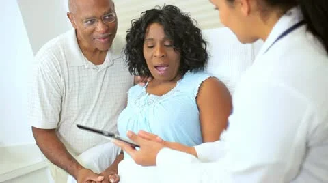 Wireless Tablet Recording Patient Care Plan Stock Footage