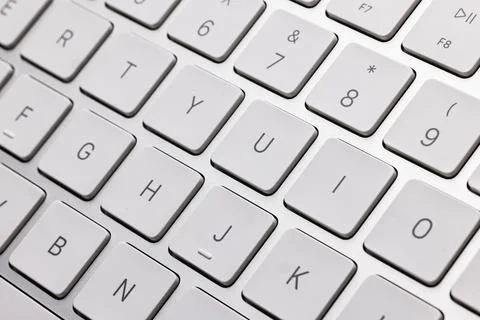 Wireless technology computer keyboard closeup view isolated white backgroud Stock Photos