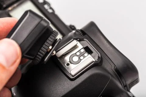 Wireless Trigger, with camera Isolated on White Background. Photographic equi Stock Photos