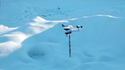 Wireless weather station on pole in snow. Sensors of temperature and humidity Stock Footage 343622397