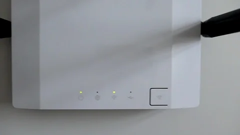 Wireless Wi-Fi Router Is On The White Table Dolly Slider Stock Footage