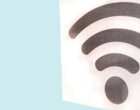 Wireless zone concept. WiFi symbol on the wall with a copy of the space isola Stock Photos