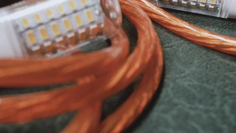 Wires for audio and led light bulbs close-up, 4 K Stock Footage 100707359