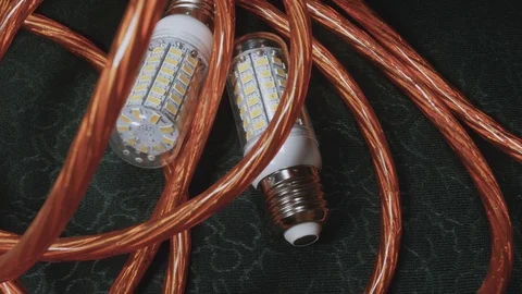 Wires for audio and led light bulbs close-up, 4 K Stock Footage 100707438