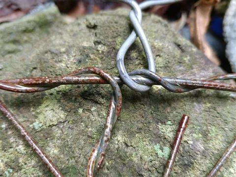 Wires binding the rocks Stock Photos