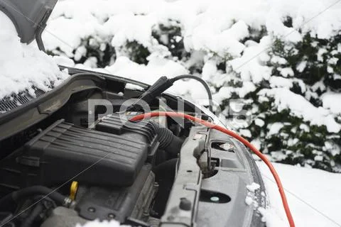 Wires On Car Battery In Snow