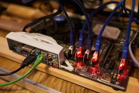Wires connected to a crypto farm for mining. several video cards work, mine Stock Photos
