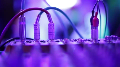 Wires connected to a mixing console. A party in a nightclub. Workplace of a DJ. Stock Footage 66575612