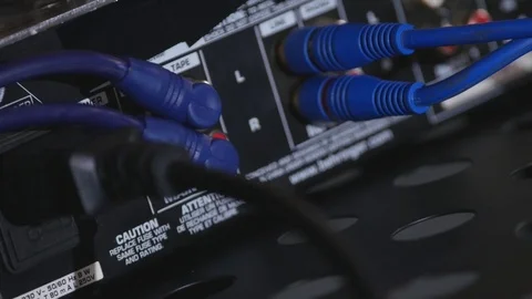 Wires connected to a mixing console. Workplace of a DJ Stock Footage 77403250