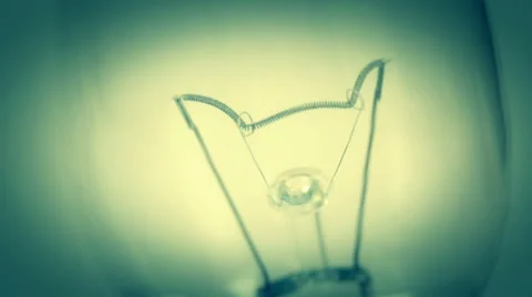 The wires inside the bulb light on Video stock 46107637