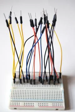 Wires plugged in to a breadboard. Fotos de archivo