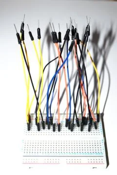 Wires plugged in to a breadboard. 写真素材