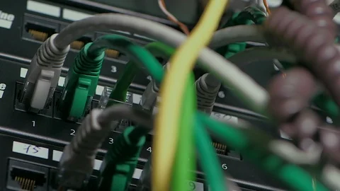 Wires plugged into a network connector Vídeos de archivo 94378561