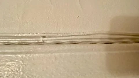 Wires on a wall 스톡 사진