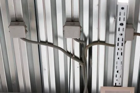 Wiring from the ceiling, Ceiling frame made of metal profile Stock Photos
