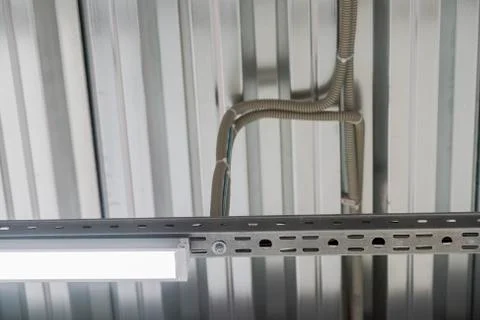 Wiring from the ceiling, Ceiling frame made of metal profile Stock Photos