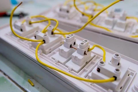 Wiring installation of electrical components in workshop Stock Photos