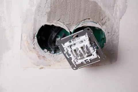 Wiring installation process at home with electrical outlet replacement in p.. Stock Photos