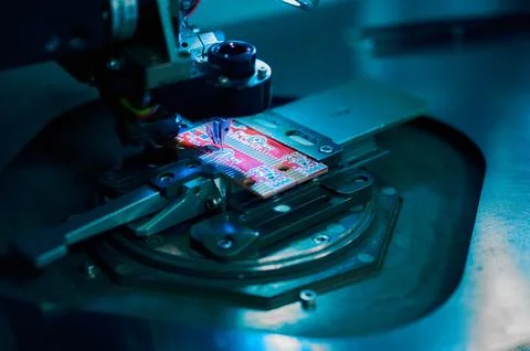 Wiring process on die bonding machine for microchip assembly in clean room Stock Photos