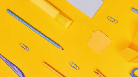 Wiring school items on a yellow background, close-up, flatley Stock Footage 136471460