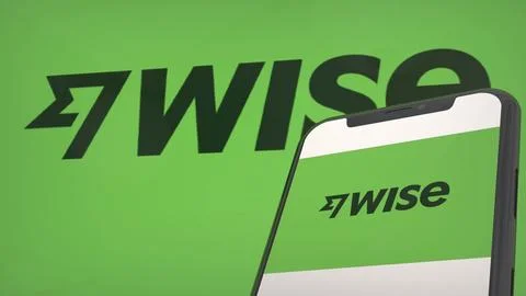 Wise app logo in mobile display screen and background editorial Stock Photos
