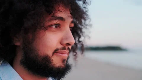 Wise Intellectual Clever Young Man Looking in Horizont, While Standing on Beach Stock Footage 148552760