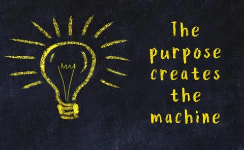 Wise quotation and a chalk drawing of a bulb on black chalkboard Stock Photos