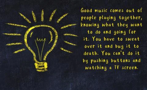 Wise quotation and a chalk drawing of a bulb on black chalkboard Stock Photos
