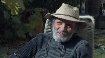 The wise white-haired old man smiling looking at camera (close-up) Stock Footage 85670540