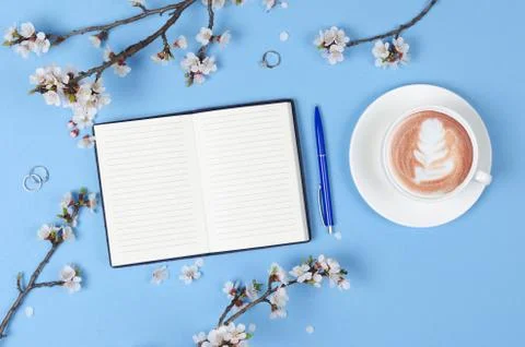 Wish list for future plans. flat lay composition with flowers,notepad and cof Stock Photos