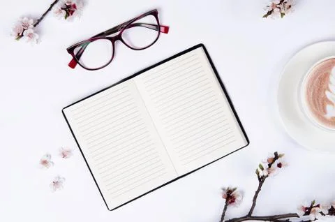 Wish list for future plans. flat lay composition with flowers,notepad and cof Stock Photos