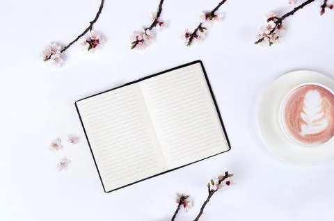 Wish list for future plans. flat lay composition with flowers,notepad and cof Stock Photos