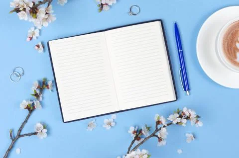Wish list for future plans. flat lay composition with flowers,notepad and cof Stock Photos