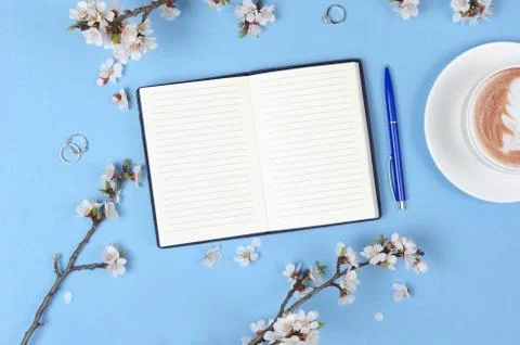 Wish list for future plans. flat lay composition with flowers,notepad and cof Stock Photos