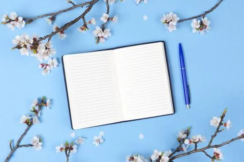 Wish list for future plans. flat lay composition with flowers, notepad Stock Photos