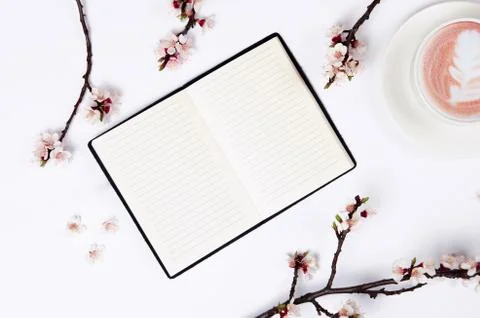 Wish list for future plans. flat lay composition with flowers,notepad and cof Stock Photos