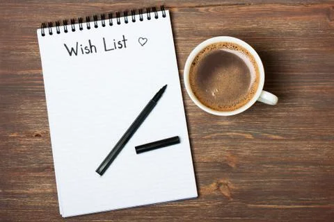 Wishlist word on a notebook Stock Photos