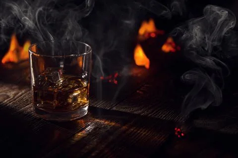 Wiskey on the rocks on fire Stock Photos