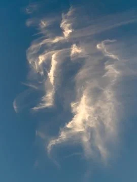 Wispy Cirrus Clouds Against Blue Sky 库存照片