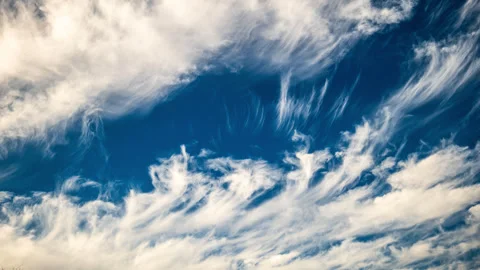 Wispy Cirrus Clouds in Blue Sky Time Lapse Stock Footage 284224066