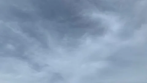 Wispy cirrus clouds moving lower left to upper right Stock Footage 130798874