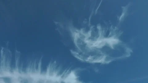 Wispy clouds against deep blue summer sky Stock Footage 36865868