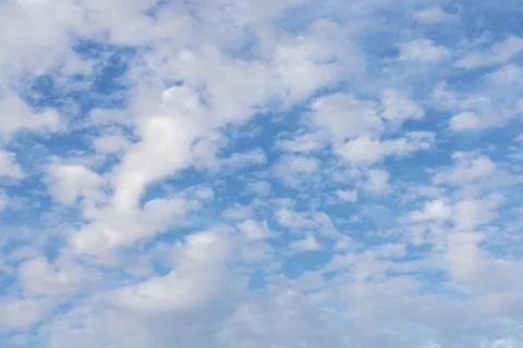 Wispy clouds in a blue sky Stock Photos