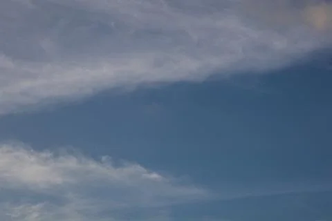 Wispy Clouds in Blue Sky Stock Photos