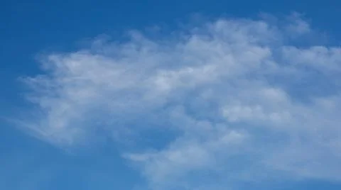 Wispy Clouds in a Blue Sky Stock Photos