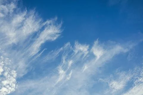 Wispy Clouds in a Blue Sky 스톡 사진