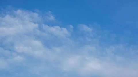 Wispy Clouds in a Clear Blue Sky Stock Photos