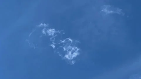 Wispy Clouds Drifting Across Blue Sky Time Lapse Stock Footage 335388020