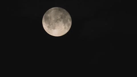 Wispy Clouds Drifting Over Full Moon at Night. Stock Footage 314615265