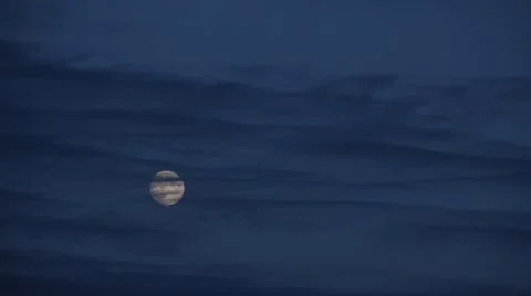 Wispy clouds moving over moon Stock Footage 44230913